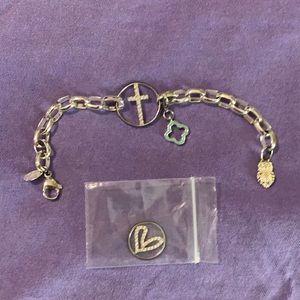 Origami Owl silver bracelet with 1 dangle and 2 inserts.